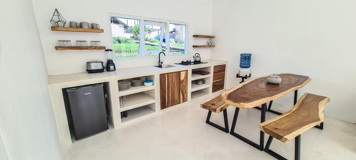 Kitchen with teak dining table and benches